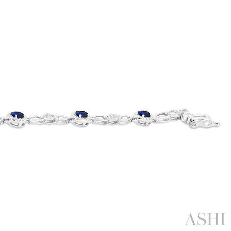 1/20 Ctw Oval Cut 4X3MM Sapphire and Round Cut Diamond Precious Fashion Bracelet in 10K White Gold